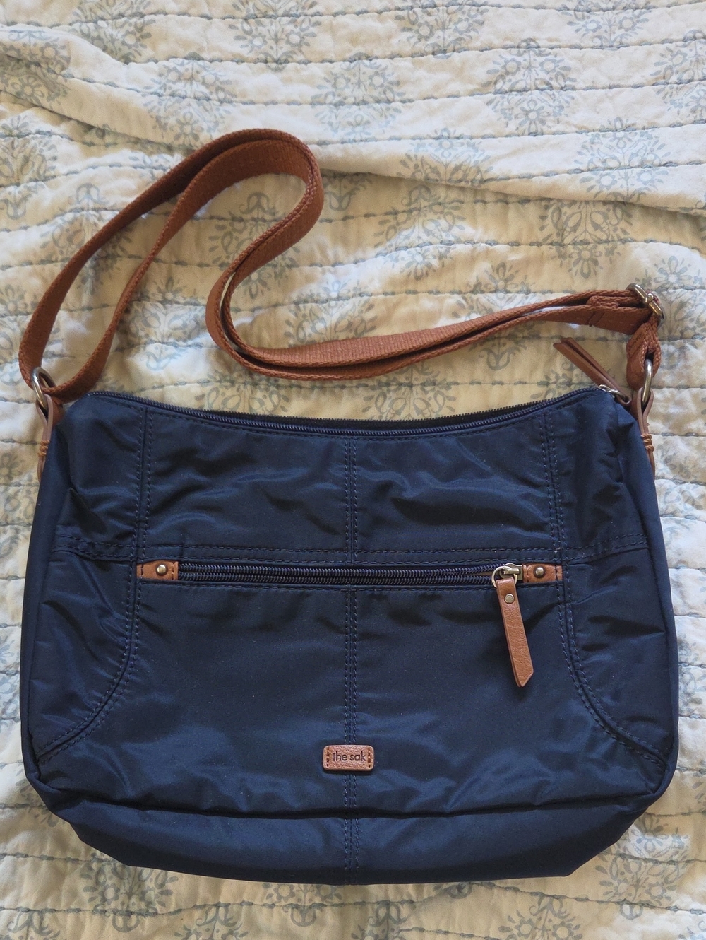 The Sak Navy Crossbody with Brown Strap & Trim